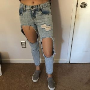 Heavily distressed Carmar jeans